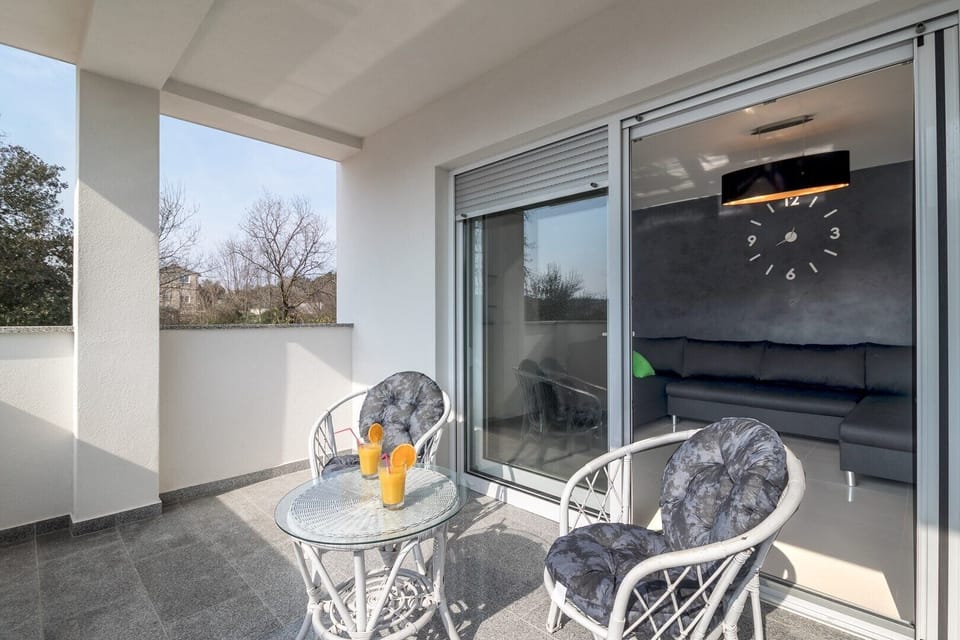 Relax on a patio with a glass of cold juice or wine