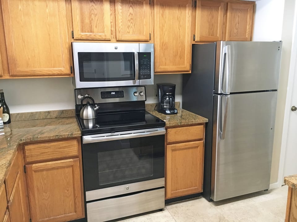 Kitchen has all new stainless steel appliances  plus washer & dryer in closet