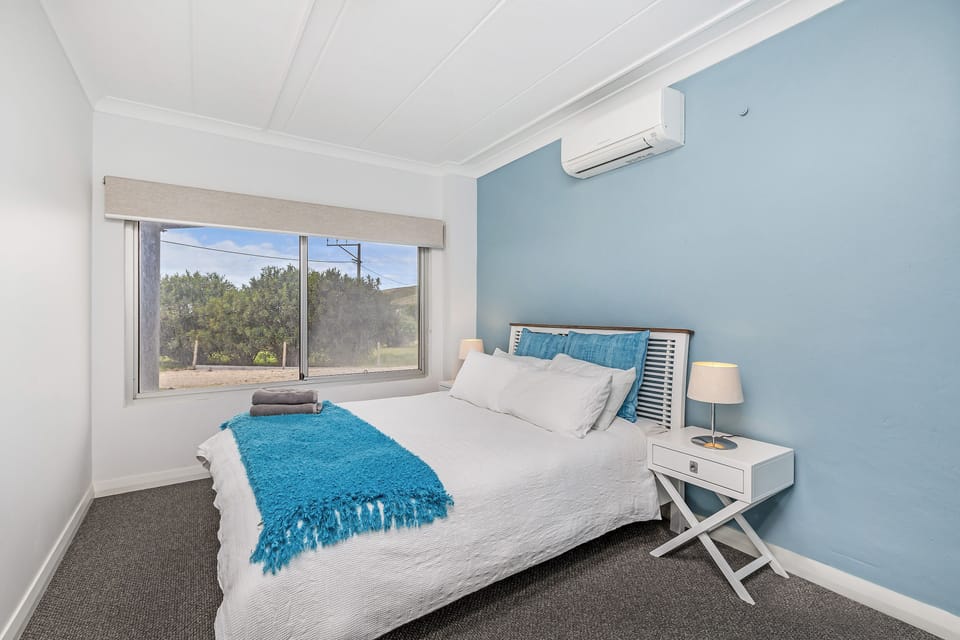 Downstairs bedroom 5 with queensize bed