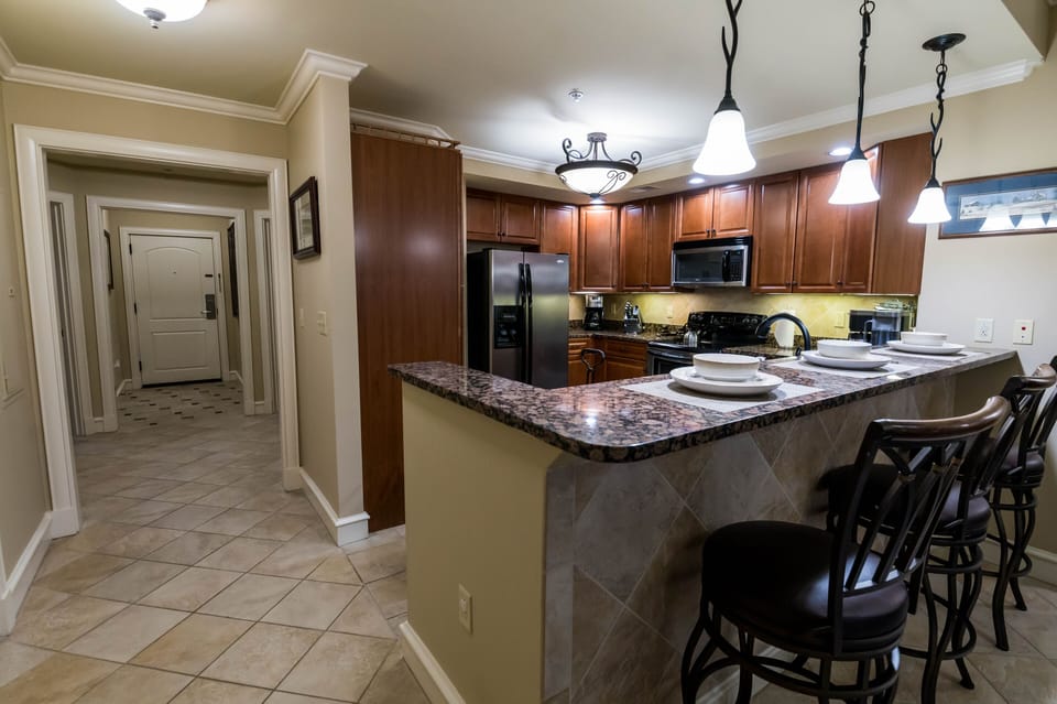 Kitchen with stainless appliances, Keurig coffee pot, regular coffee pot