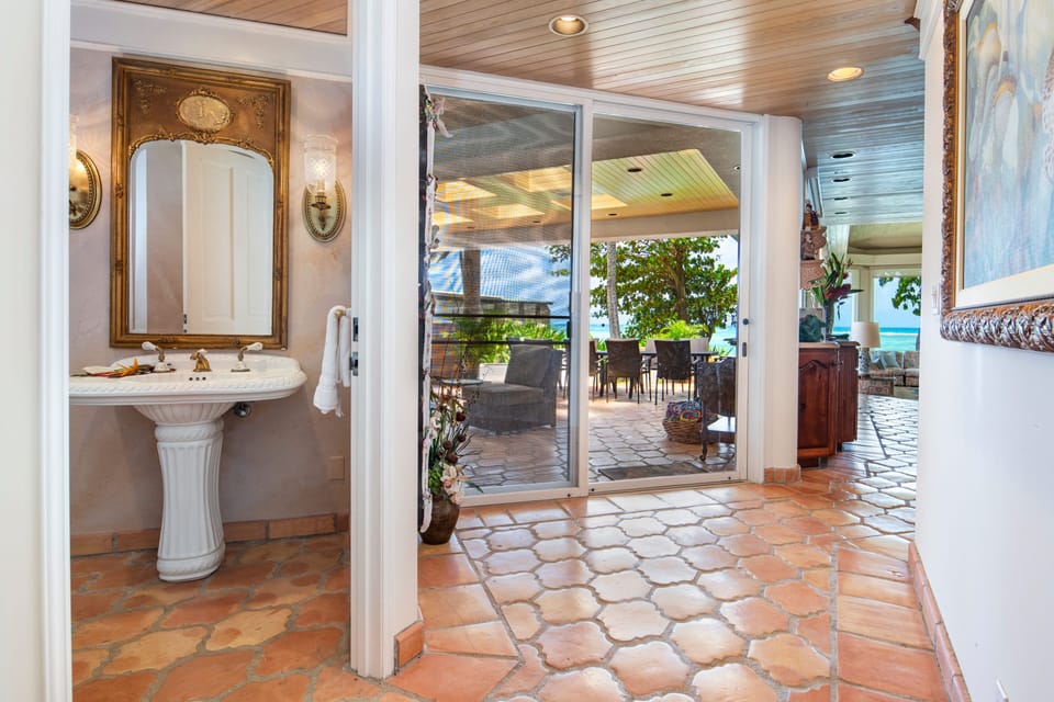 View 1/2 bathroom and lanai