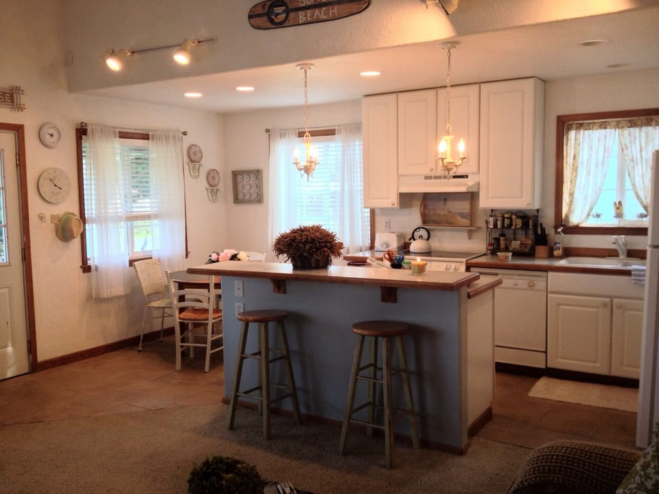 The kitchen is open to the living room area.