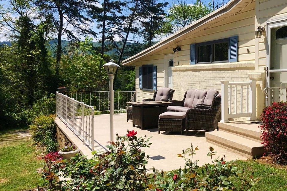 Relax on the front porch with outdoor gas fire pit. 