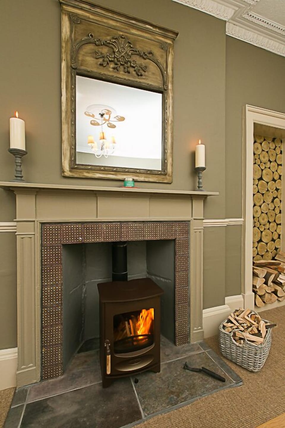 Wood burning stove and original surround.