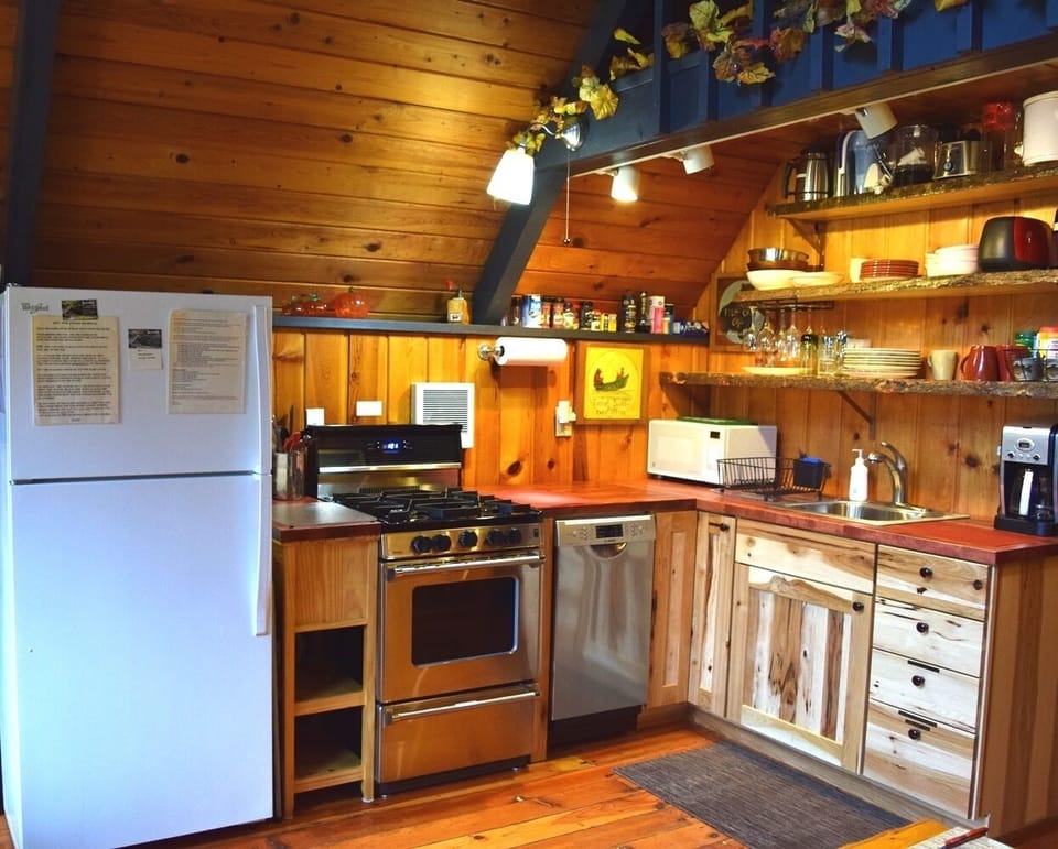 Small kitchen is efficiently set up for easy-to-prepare meals.
