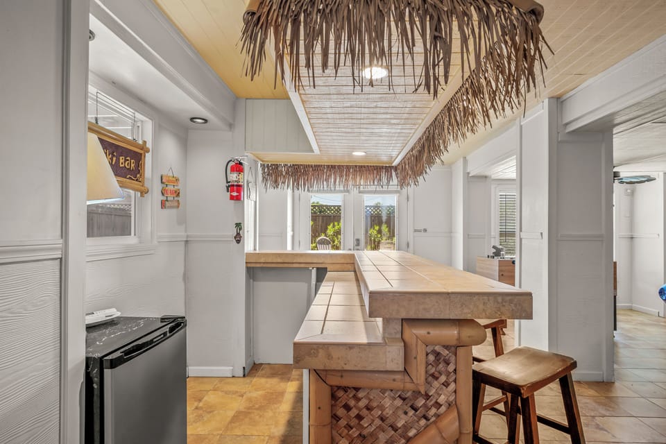 Tiki Bar w/ Mini Refrigerator (Downstairs)