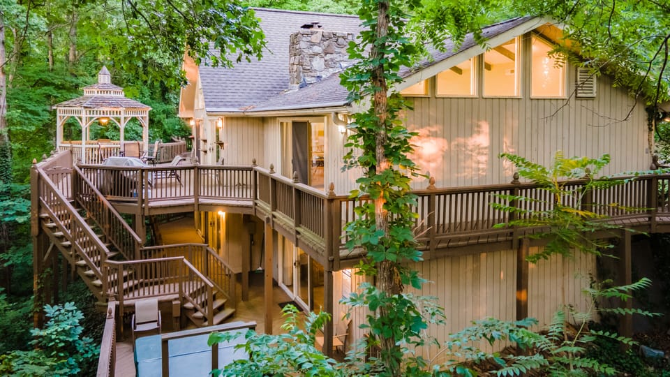 Upper and lower decks with the hot tub