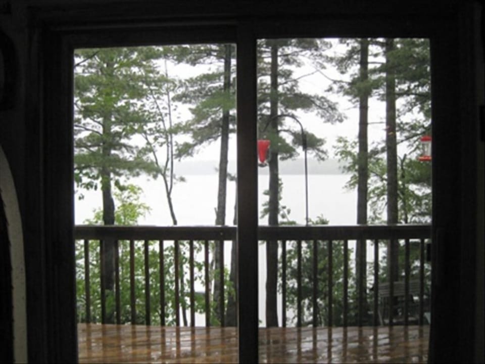 From Great Room onto large back deck/lake-gorgeous view of many colorful sunsets