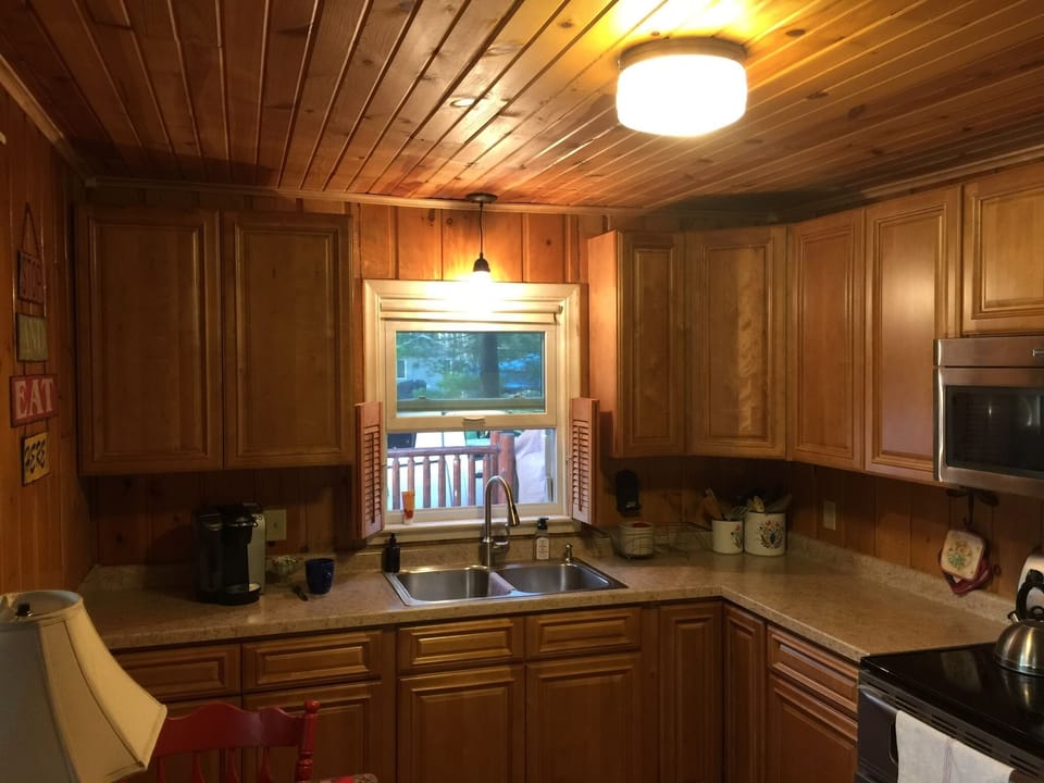 New kitchen with stainless steel appliances.