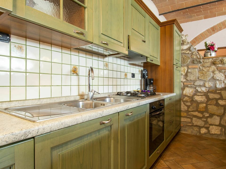 Cabinetry, Countertop, Tap, Property, Furniture, Kitchen, Wood, Kitchen Sink, Kitchen Stove, Sink