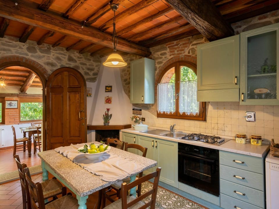 Cabinetry, Furniture, Property, Countertop, Table, Window, Building, Sink, Tap, Chair