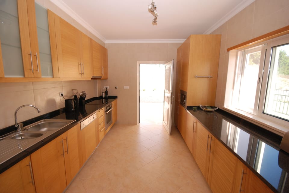 Luxury Fully-Fitted Kitchen leading to Rear Garden