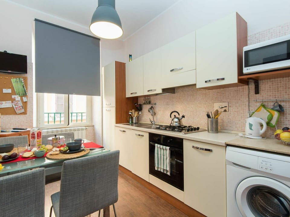 Cabinetry, Furniture, Countertop, Property, Kitchen Appliance, Kitchen Stove, Laundry Room, Kitchen, Lighting, Interior Design