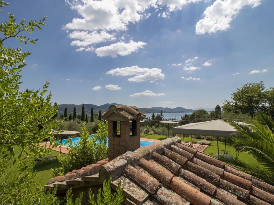 Vegetation, Natural Landscape, Property, House, Sky, Tree, Roof, Cloud, Cottage, Home