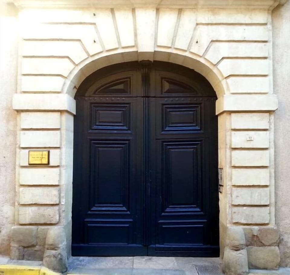 The large entry door to the historic residence, repainted in 2014.