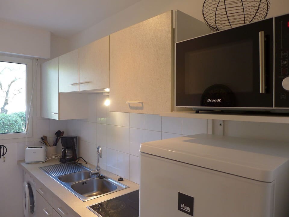 Room, Property, Cabinetry, Furniture, Countertop, Interior Design, Kitchen, Sink, House, Tile