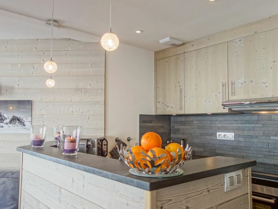 Cabinetry, Countertop, Property, Kitchen, Wood, Interior Design, Lighting, Orange, Drawer