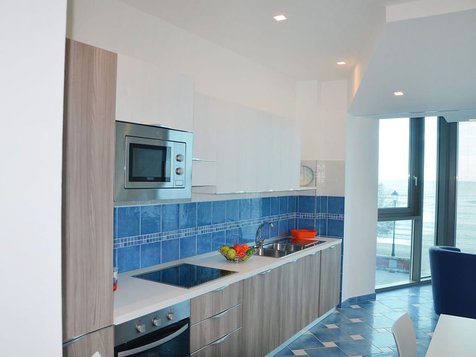 Room, Property, Furniture, Countertop, Kitchen, Interior Design, Cabinetry, Building, House, Architecture