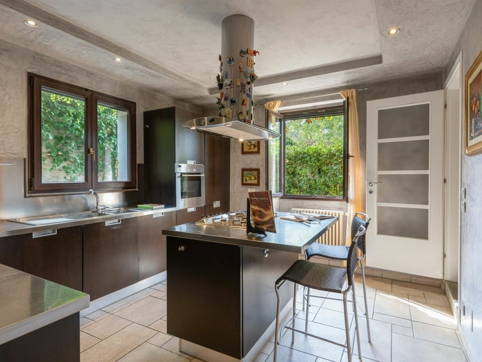 Cabinetry, Countertop, Furniture, Property, Window, Table, Chair, Sink, Tap, Wood
