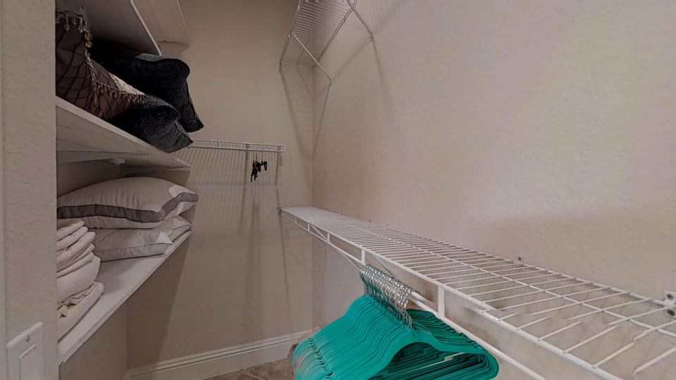 Plenty of closet space in the master with extra bedding
