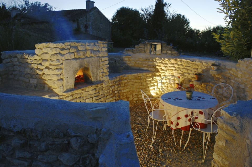 pizza/ bread oven, eating area.