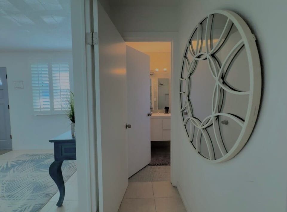 Hallway from Primary Bedroom to Full Bathroom