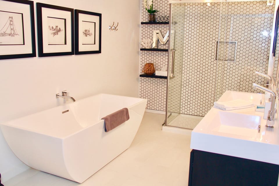 Big, beautiful spa bathroom with free-standing soaker tub and walk-in shower.