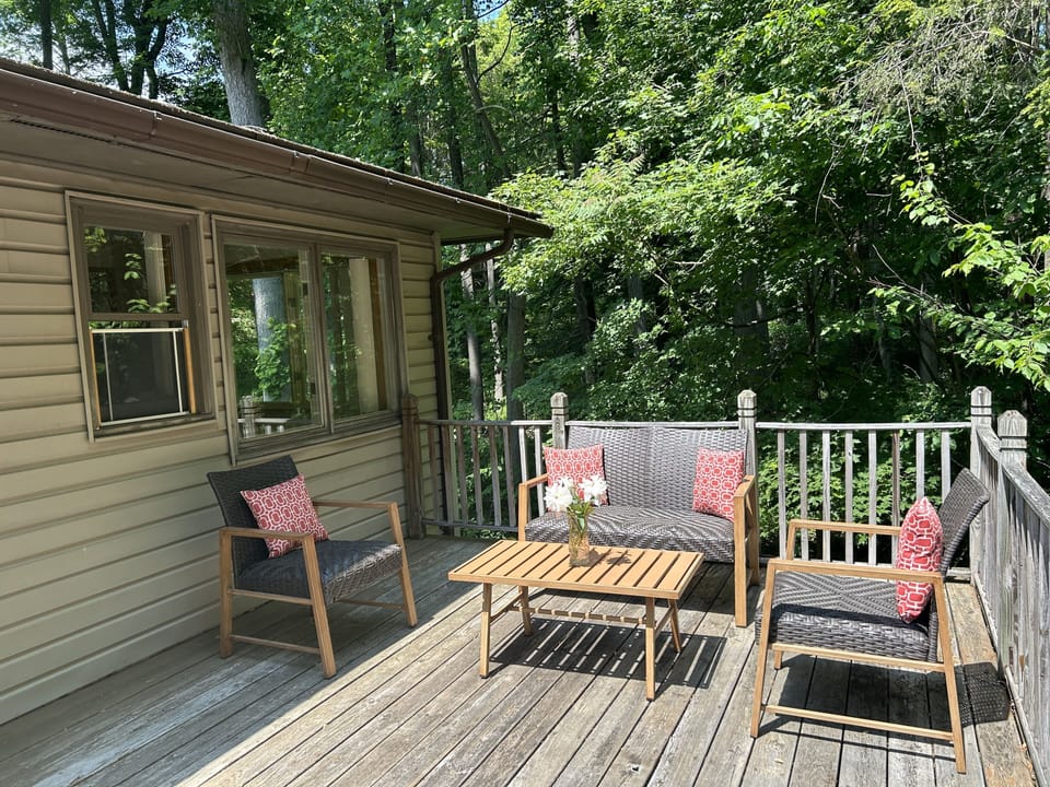 Full wrap around deck with patio furniture