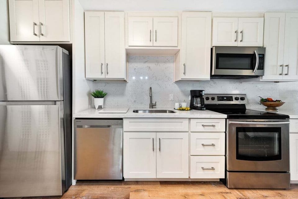 Enjoy cooking at your fully furnished kitchen with stainless steel appliances