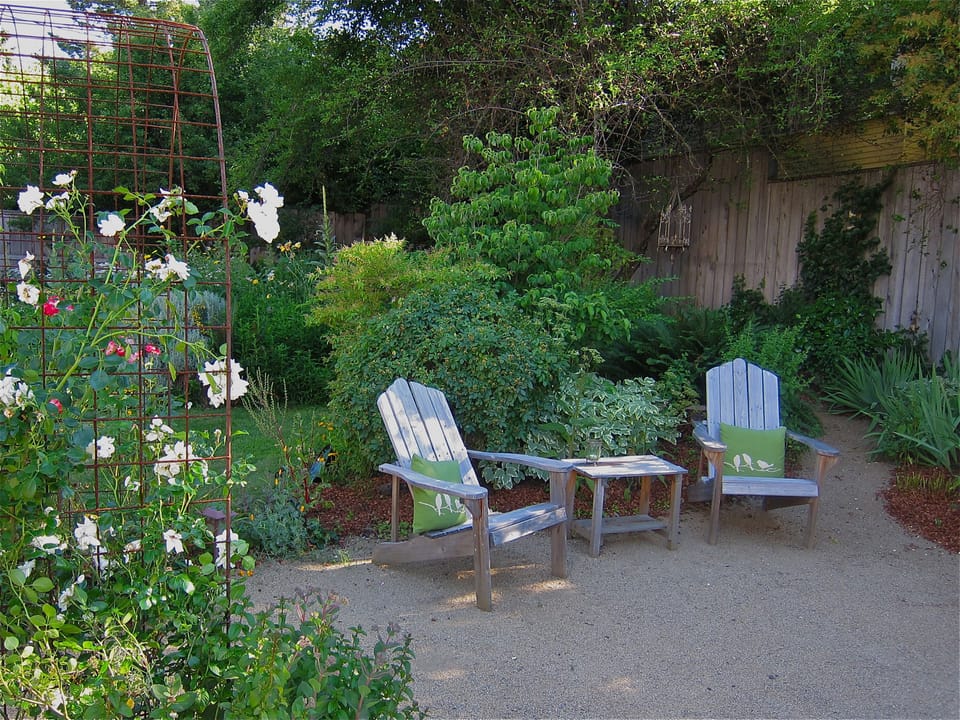 Relax in Comfy Chairs or Dine Outdoors at the Shaded Table for Two. Gas BBQ!