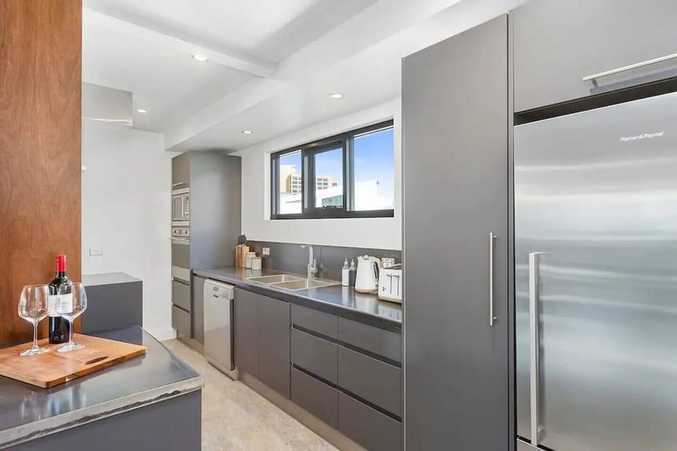 Cook up a storm in the fully equipped kitchen, featuring modern appliances and plenty of counter space.