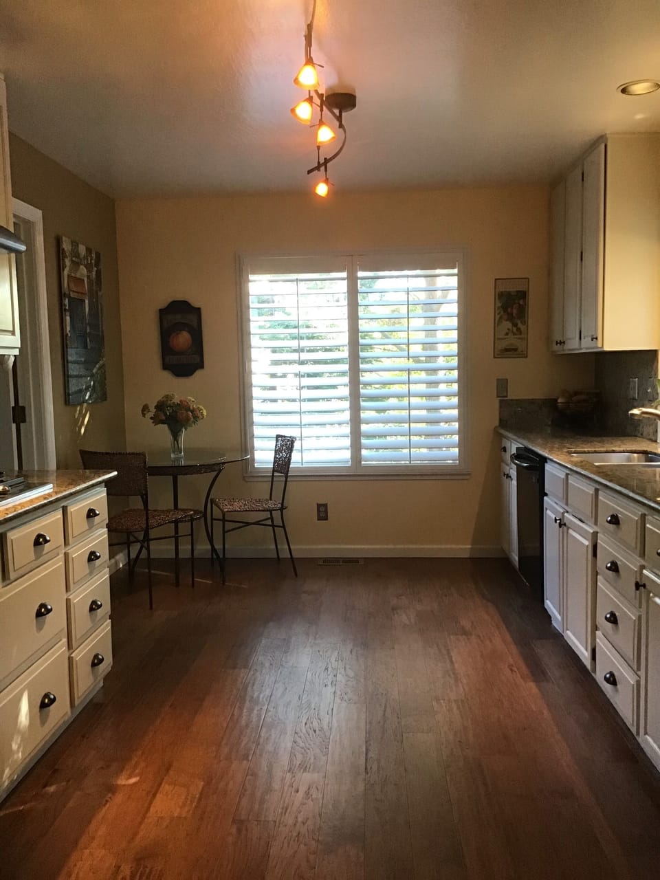 Small bistro table seating perfect for enjoying a cup of coffee in the morning.