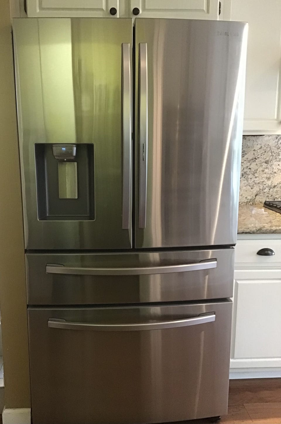 Full size three door refrigerator.