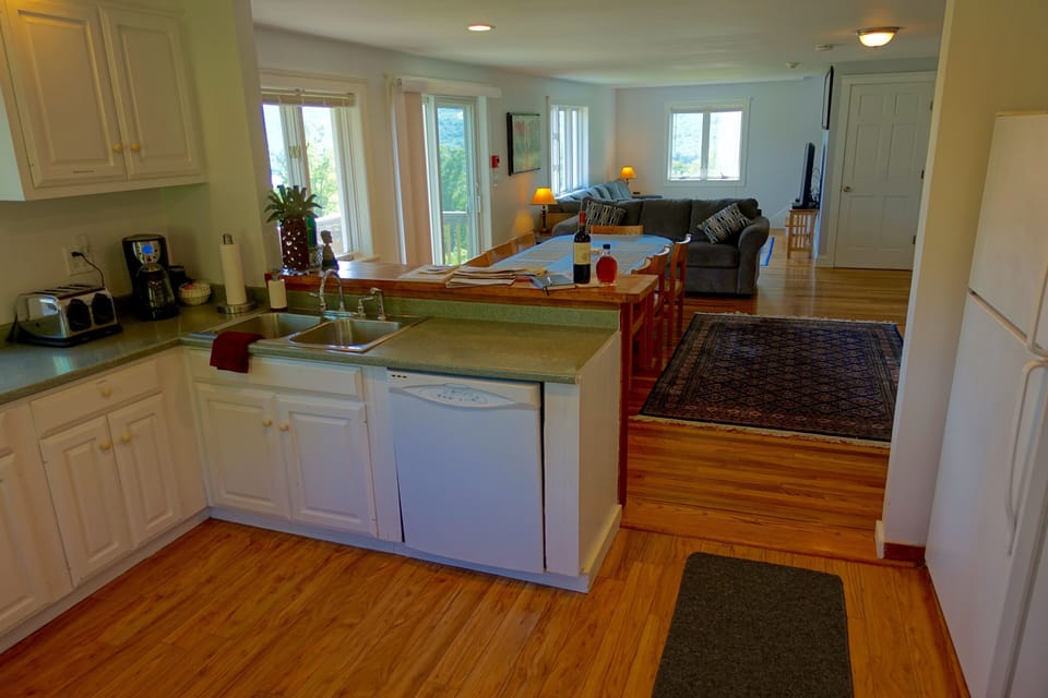 Long Open Living Area - which opens to Decks for Relaxation