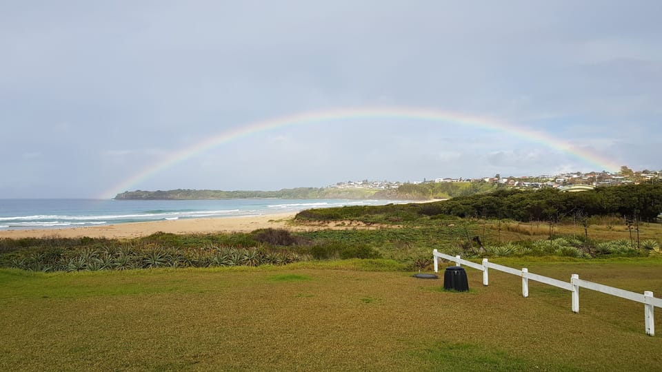 Backyard view complete with a rainbow.