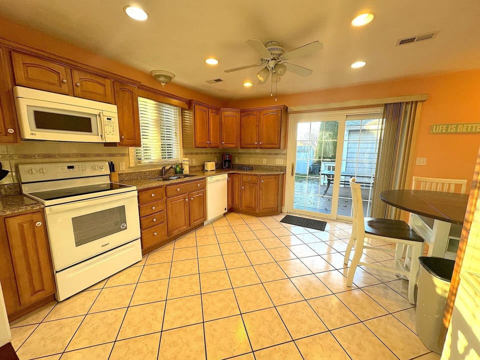 Kitchen with ample utensils 