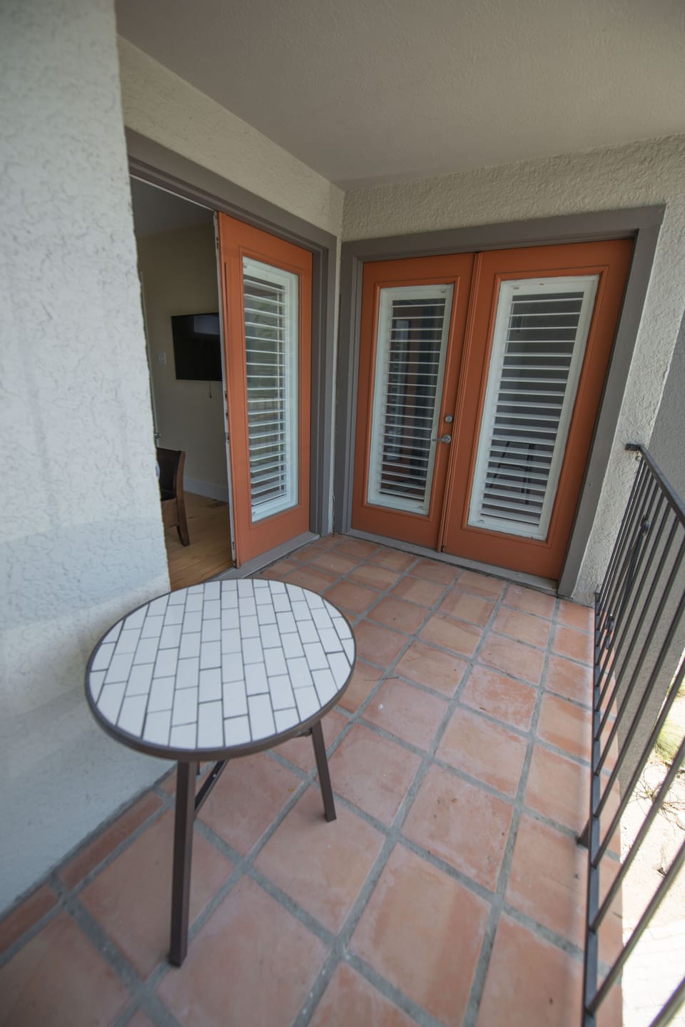Upstairs balcony accessible from both bedrooms.