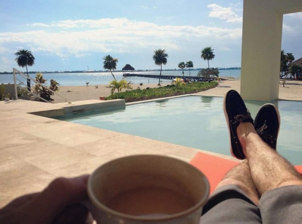 View of lagoon and San Pedro from the pool-enjoying morning coffee. 