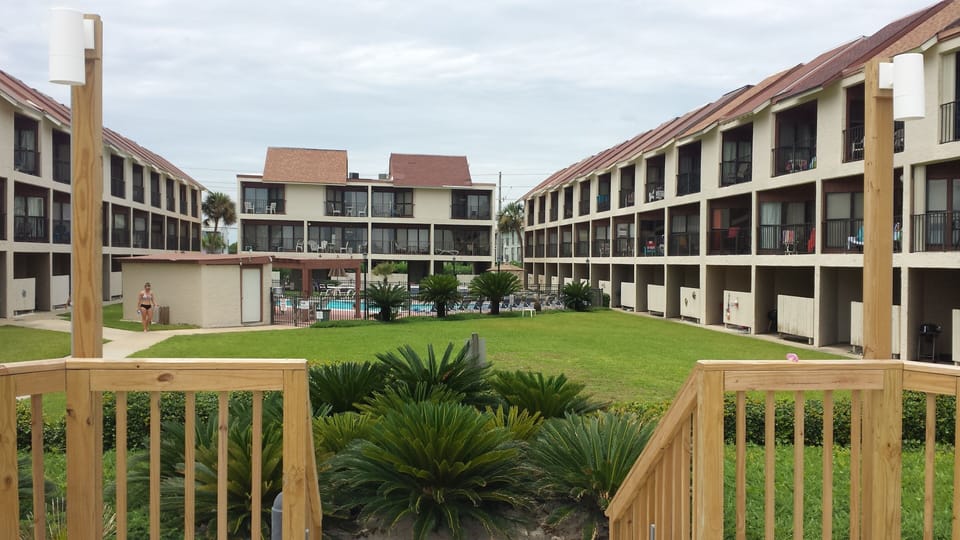Convenient beach access with outdoor shower, and benches to enjoy the view!