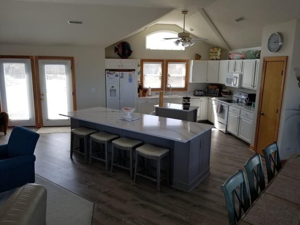 Third floor open living room, dining room & kitchen 