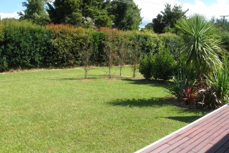 Deck and lawn area WITH ROOM TO PARK THE BOAT.