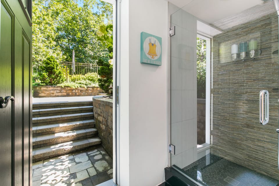 Lower level Full bathroom, leading to pool
