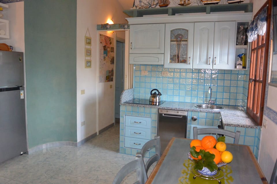 Open kitchen and hallway leading to the bedrooms