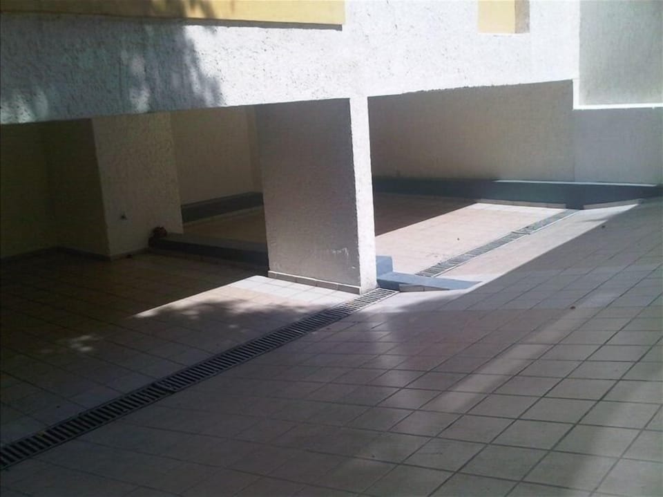 Carport for 2 compact cars per apartment