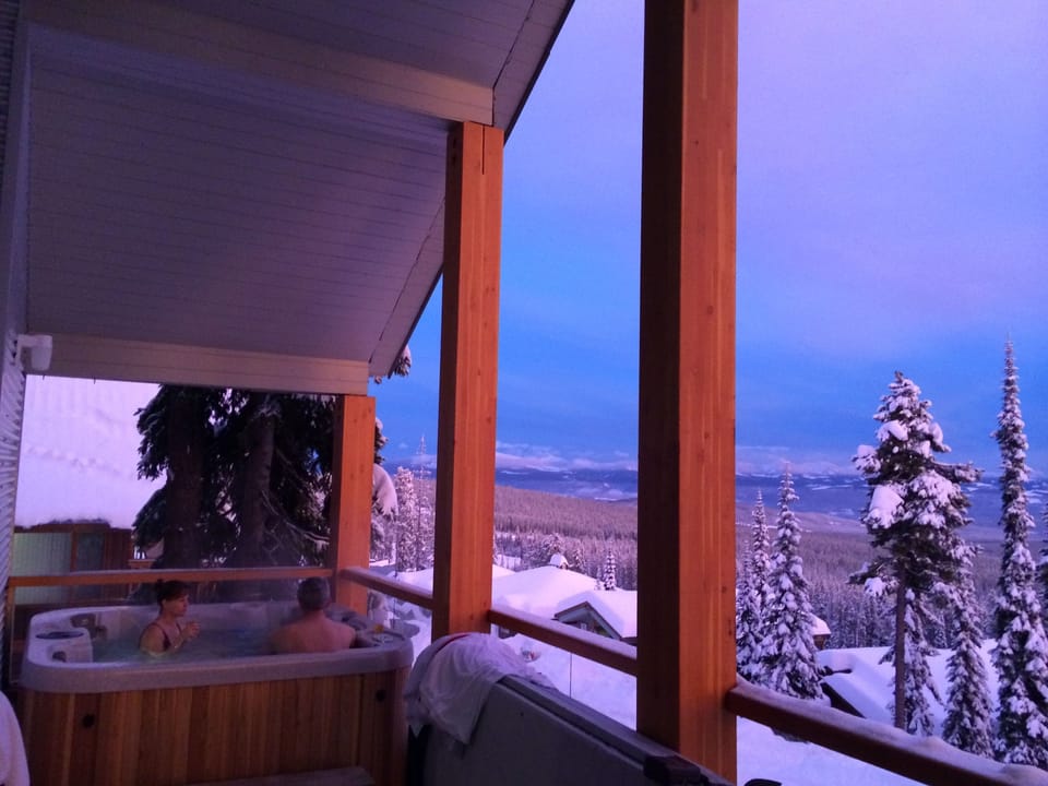 Enjoy the hot tub on our balcony (ski season only) and the BBQ