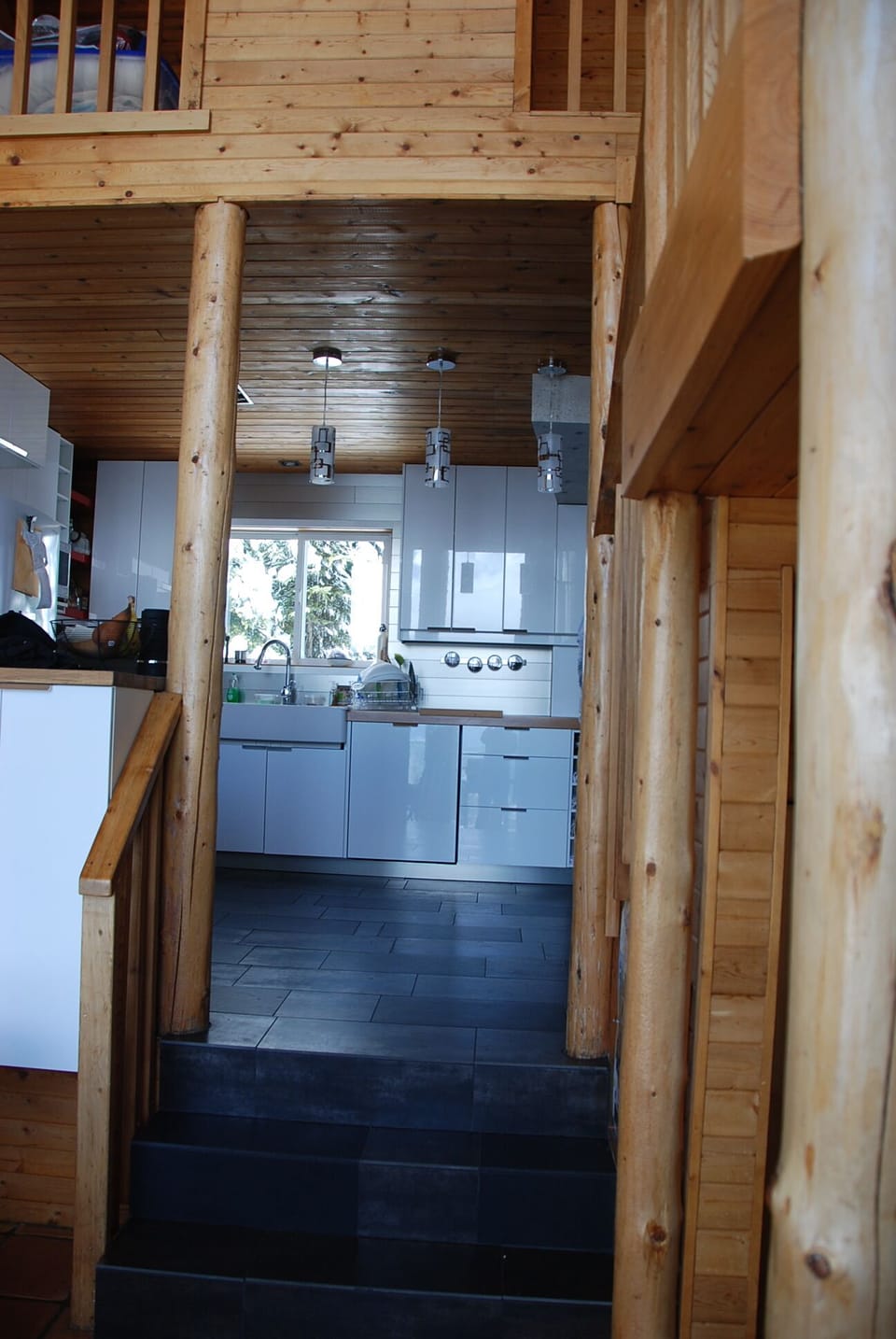 Leading from Suite A dining to kitchen