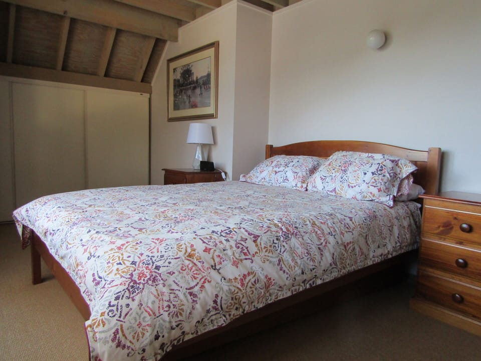 Bedroom with queen bed on 1st floor