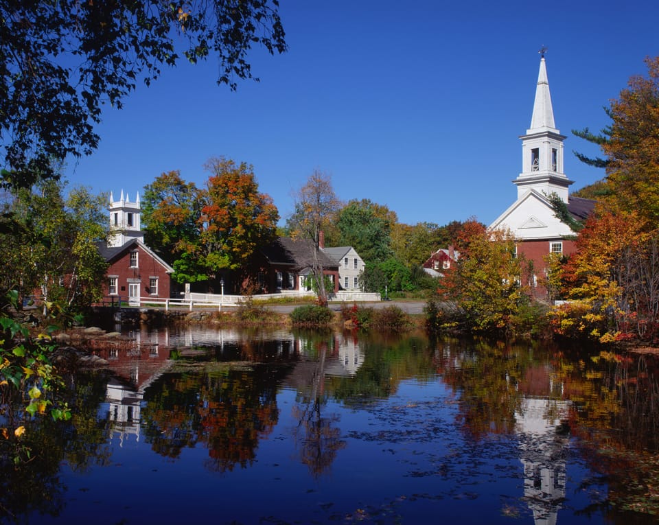 The village of Harrisville, New Hampshire as seen from Harrisville Pond.