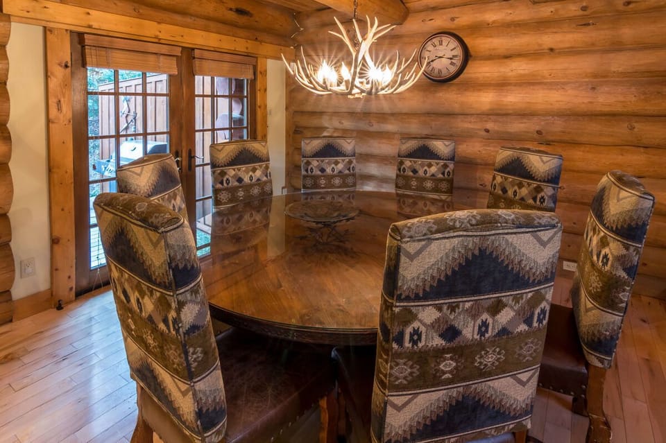 Eight seats at the round dining table with access to private deck