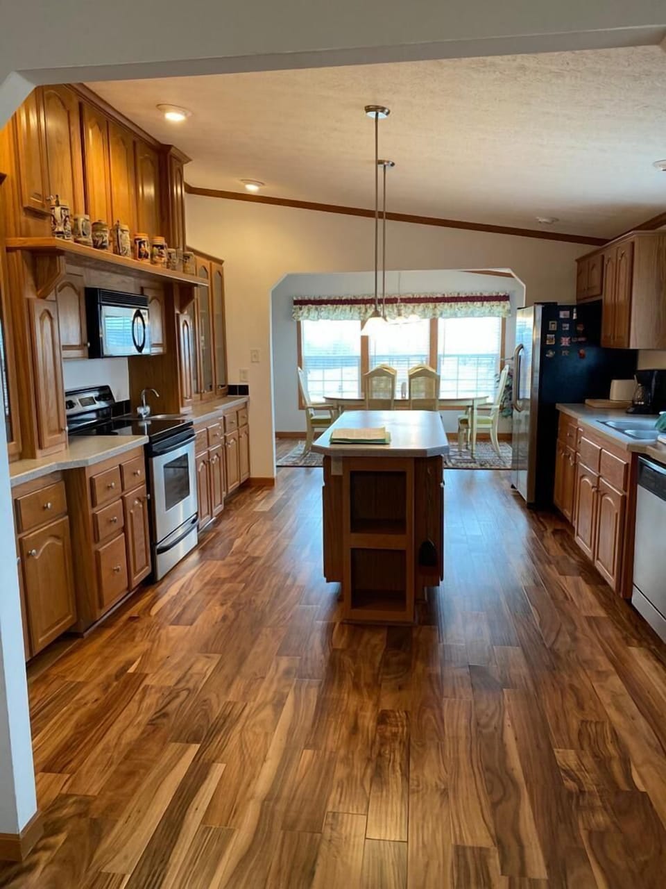 View from living room to kitchen and dining room